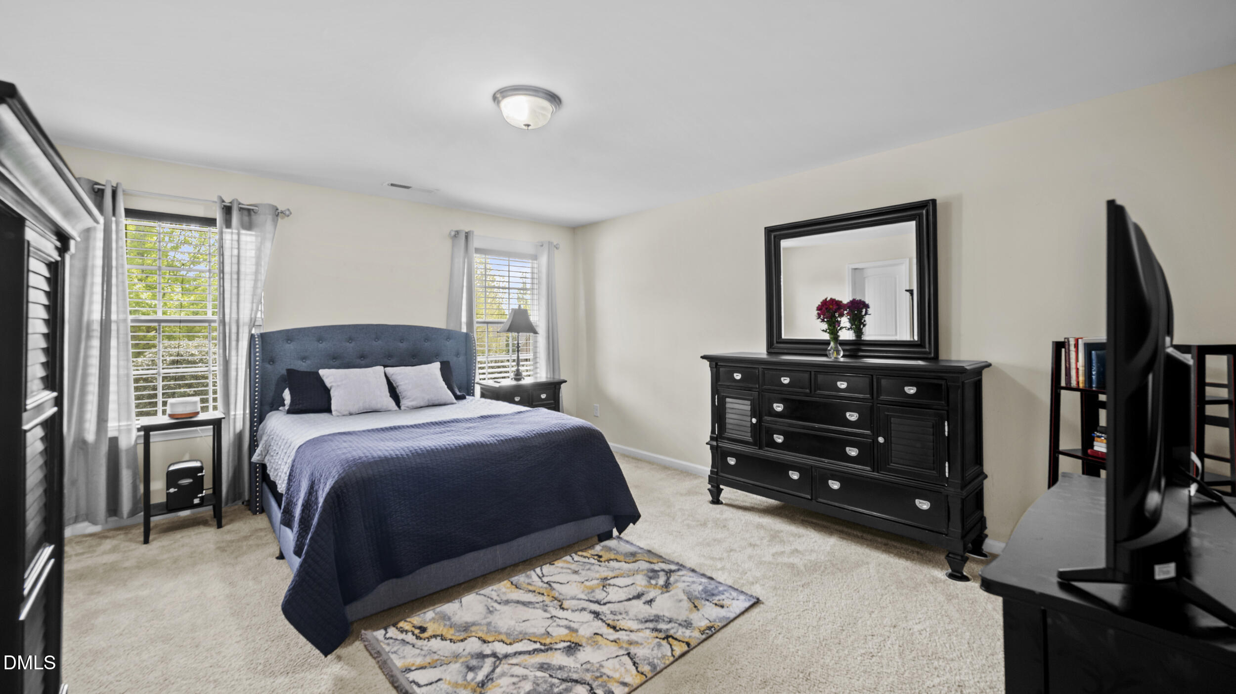 2050 Sinclair Burlington, NC 27215 - Photo 14 of 17 a bedroom with a bed and a dresser
