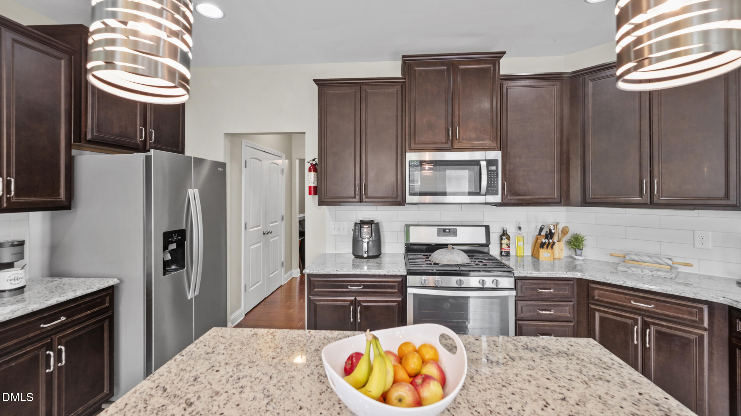 2050 Sinclair Burlington, NC 27215 - Photo 6 of 17 a kitchen with stainless steel appliances granite countertop a refrigerator stove and sink