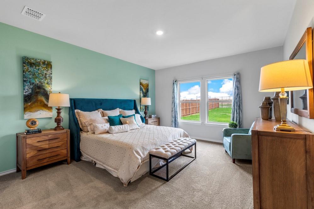 168 Mojave Road Boyd, TX 76023 - Photo 11 of 37 a bedroom with a bed and couch