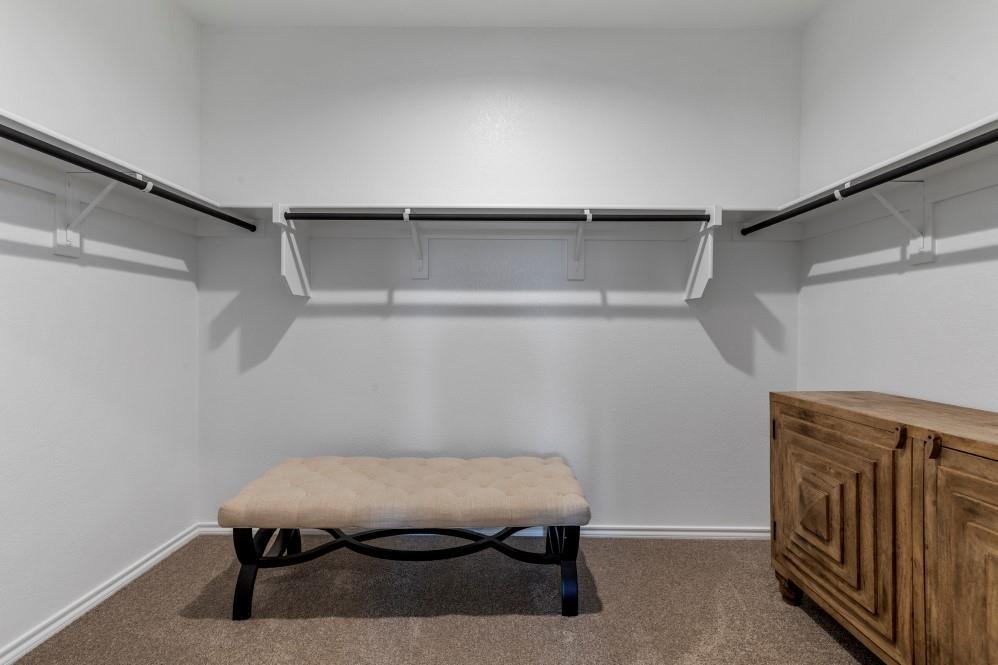 168 Mojave Road Boyd, TX 76023 - Photo 16 of 37 a view of a room with racks on the wall