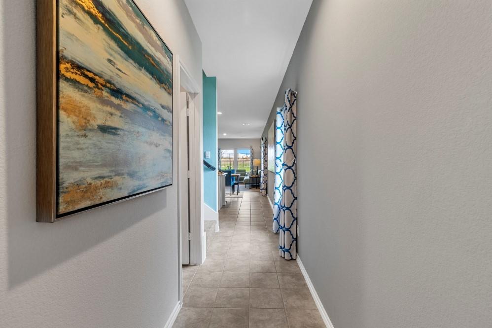 168 Mojave Road Boyd, TX 76023 - Photo 28 of 37 a view of a hallway with wooden floor and a living room