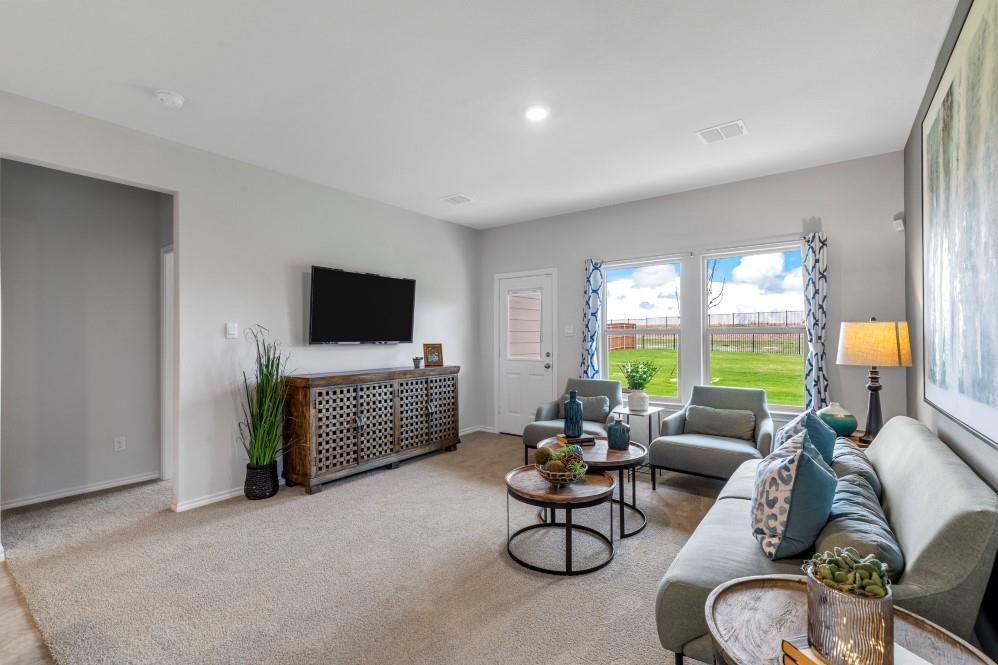 168 Mojave Road Boyd, TX 76023 - Photo 8 of 37 a living room with furniture and a flat screen tv