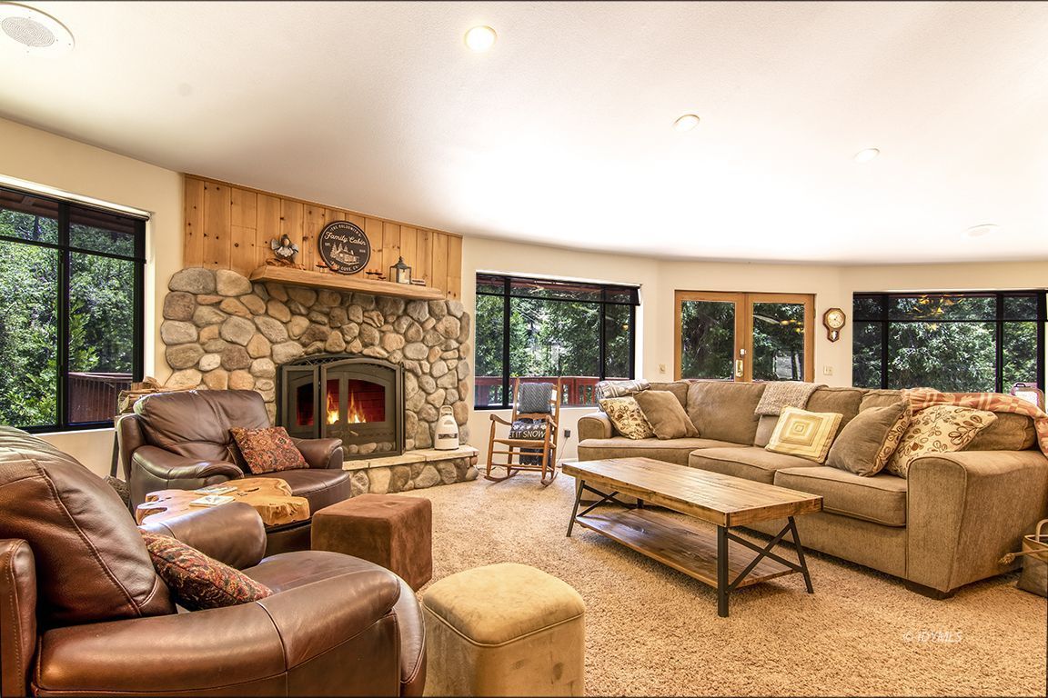 24625 Baldy Road Idyllwild, CA 92549 - Photo 11 of 80 a living room with furniture and a fireplace