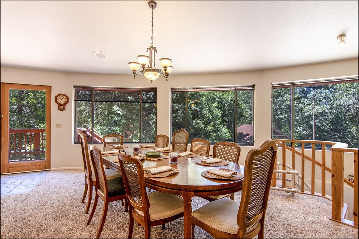 24625 Baldy Road Idyllwild, CA 92549 - Photo 15 of 80 a view of a dining room with furniture window and outside view