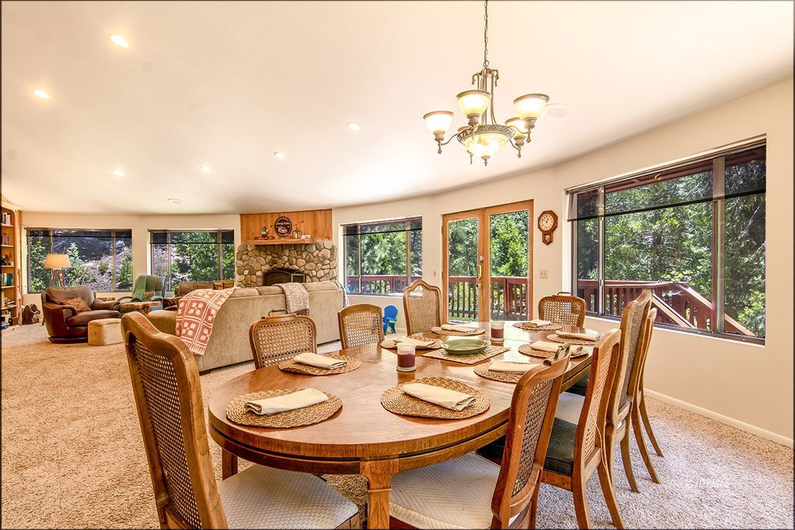 24625 Baldy Road Idyllwild, CA 92549 - Photo 16 of 80 a view of a dining room with furniture window and outside view