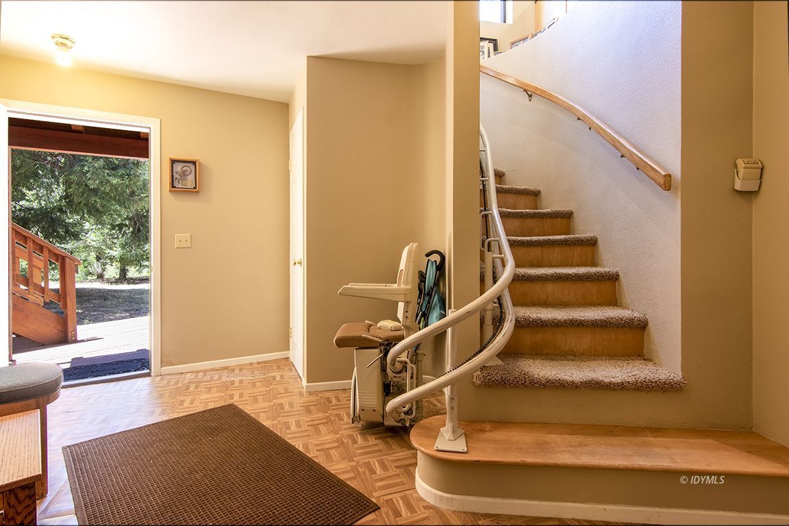 24625 Baldy Road Idyllwild, CA 92549 - Photo 42 of 80 a view of staircase with wooden floor and windows