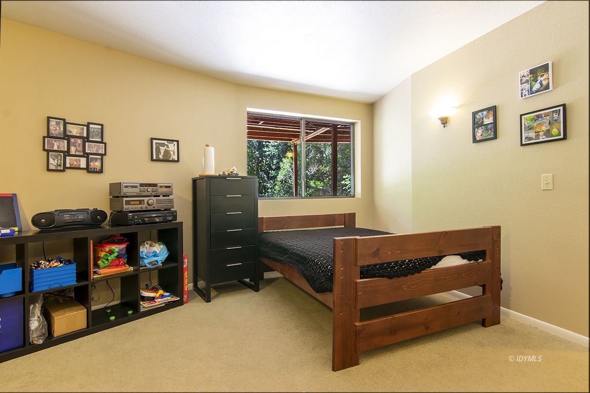 24625 Baldy Road Idyllwild, CA 92549 - Photo 49 of 80 a bedroom with a bed and wooden floor