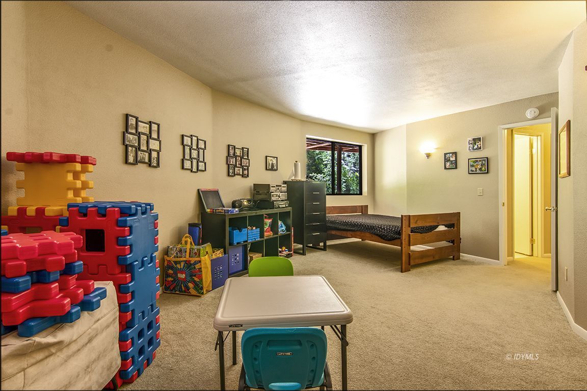 24625 Baldy Road Idyllwild, CA 92549 - Photo 51 of 80 a room with furniture and a wooden table