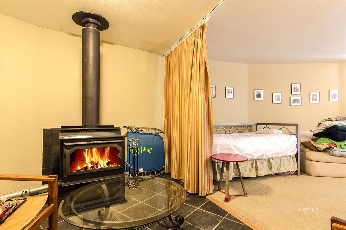 24625 Baldy Road Idyllwild, CA 92549 - Photo 54 of 80 a room with furniture and a flat screen tv