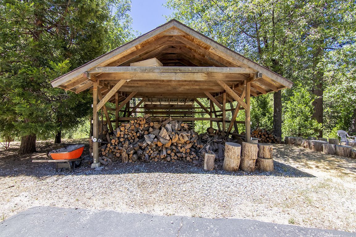 24625 Baldy Road Idyllwild, CA 92549 - Photo 73 of 80 a view of a wooden house with a yard