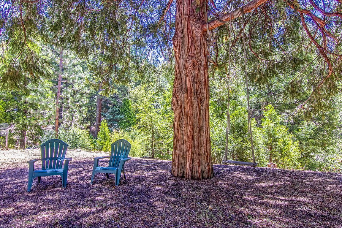 24625 Baldy Road Idyllwild, CA 92549 - Photo 76 of 80 a backyard of a house with outdoor seating