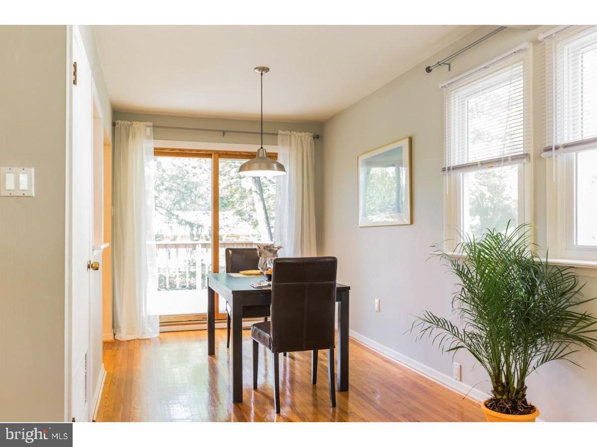 601 Pardee Lane Haddonfield, NJ 08033 - Photo 12 of 37 a view of a dining room with furniture window and wooden floor