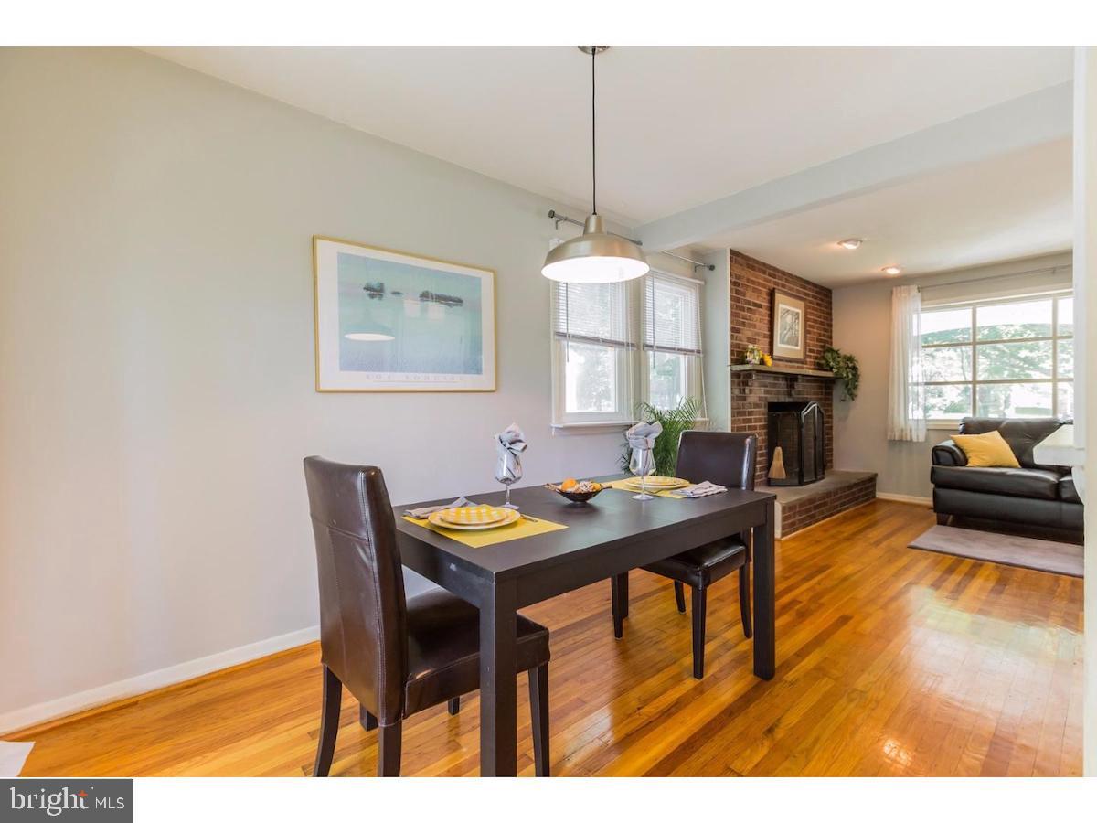 601 Pardee Lane Haddonfield, NJ 08033 - Photo 14 of 37 a view of a dining room with furniture and a chandelier