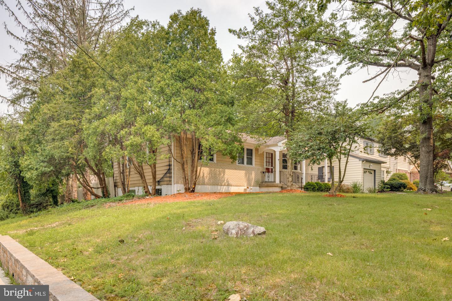 601 Pardee Lane Haddonfield, NJ 08033 - Photo 3 of 37 a view of a building with a big yard