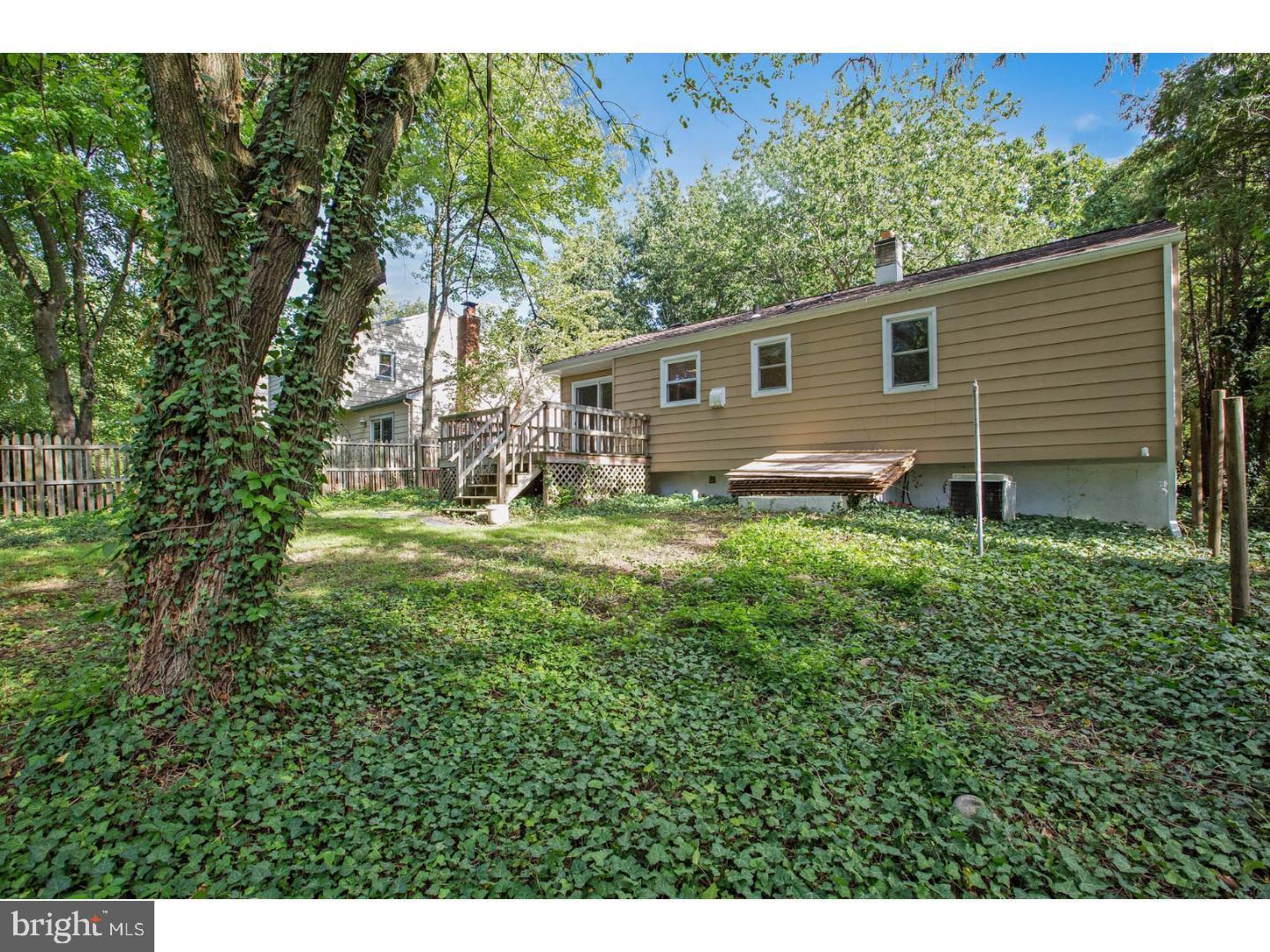 601 Pardee Lane Haddonfield, NJ 08033 - Photo 37 of 37 a backyard of a house with yard and outdoor seating