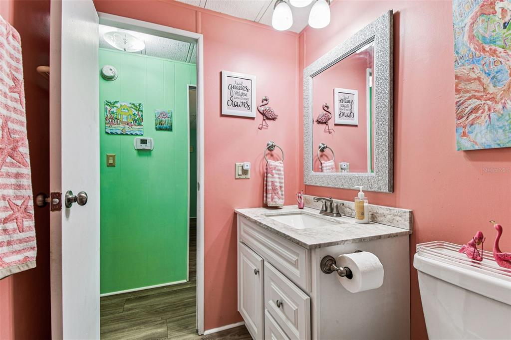12501 Ulmerton Road, Unit 71 Largo, FL 33774 - Photo 29 of 75 a bathroom with a sink vanity and a mirror