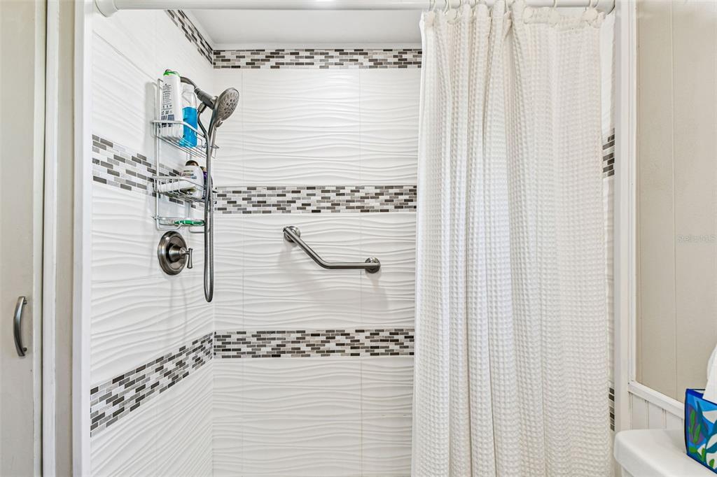 12501 Ulmerton Road, Unit 71 Largo, FL 33774 - Photo 38 of 75 a bathroom with a shower
