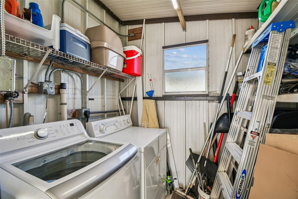 12501 Ulmerton Road, Unit 71 Largo, FL 33774 - Photo 43 of 75 a utility room with dryer and washer