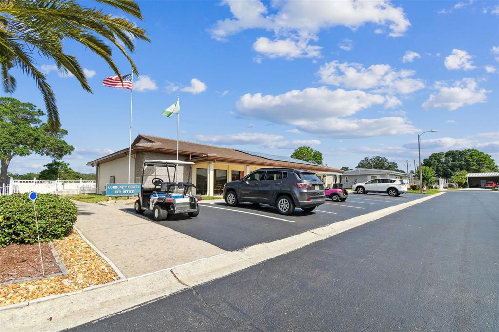12501 Ulmerton Road, Unit 71 Largo, FL 33774 - Photo 68 of 75 a view of a cars park in front of a house