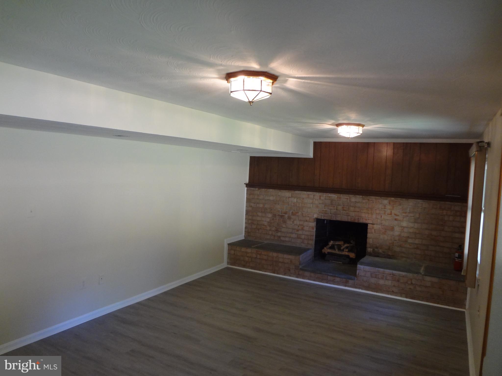 1616 Winding Waye Lane Silver Spring, MD 20902 - Photo 11 of 46 Family Room with Gas Logs