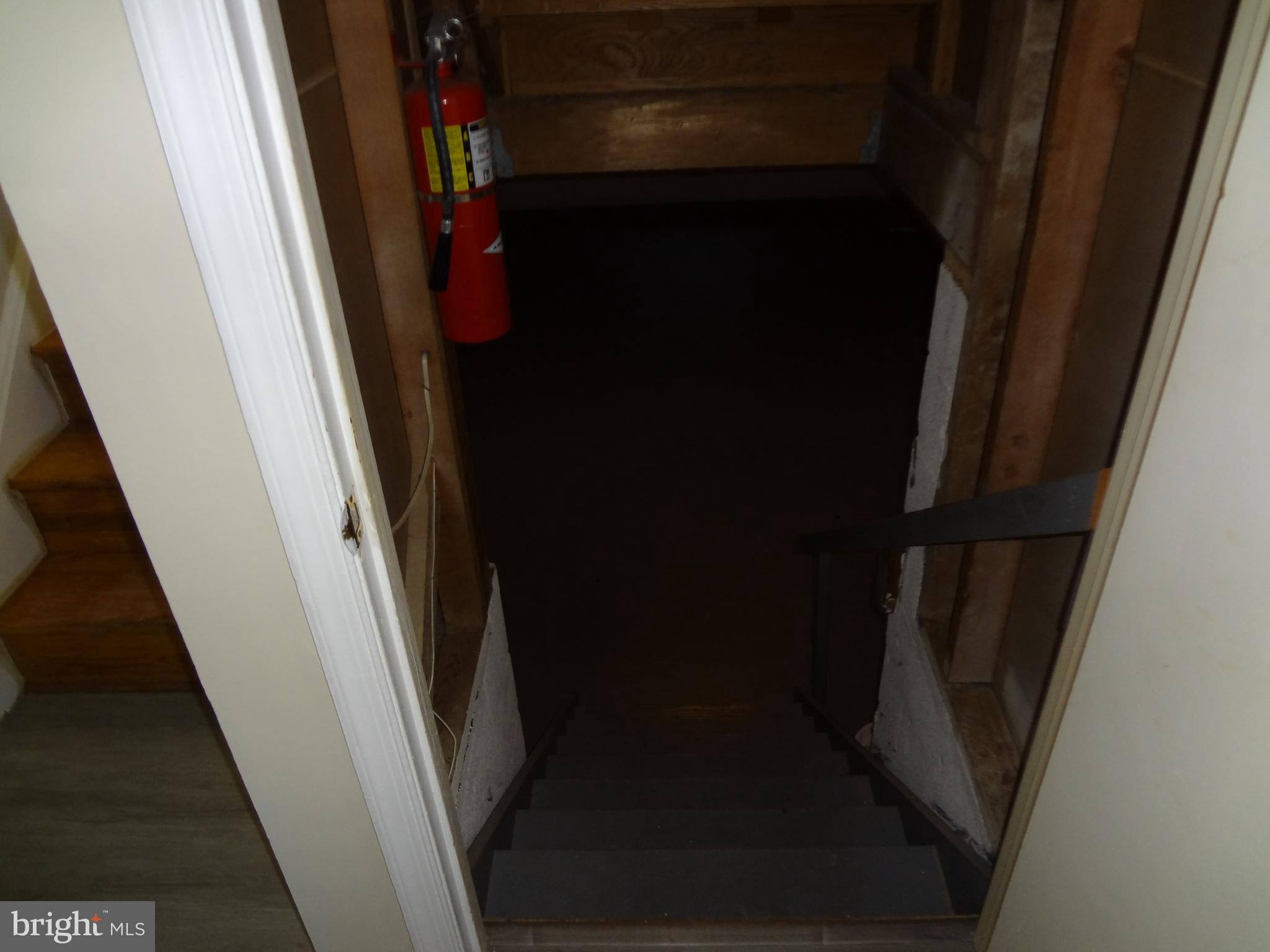 1616 Winding Waye Lane Silver Spring, MD 20902 - Photo 14 of 46 Stairs down to basement Laundry and Utilities
