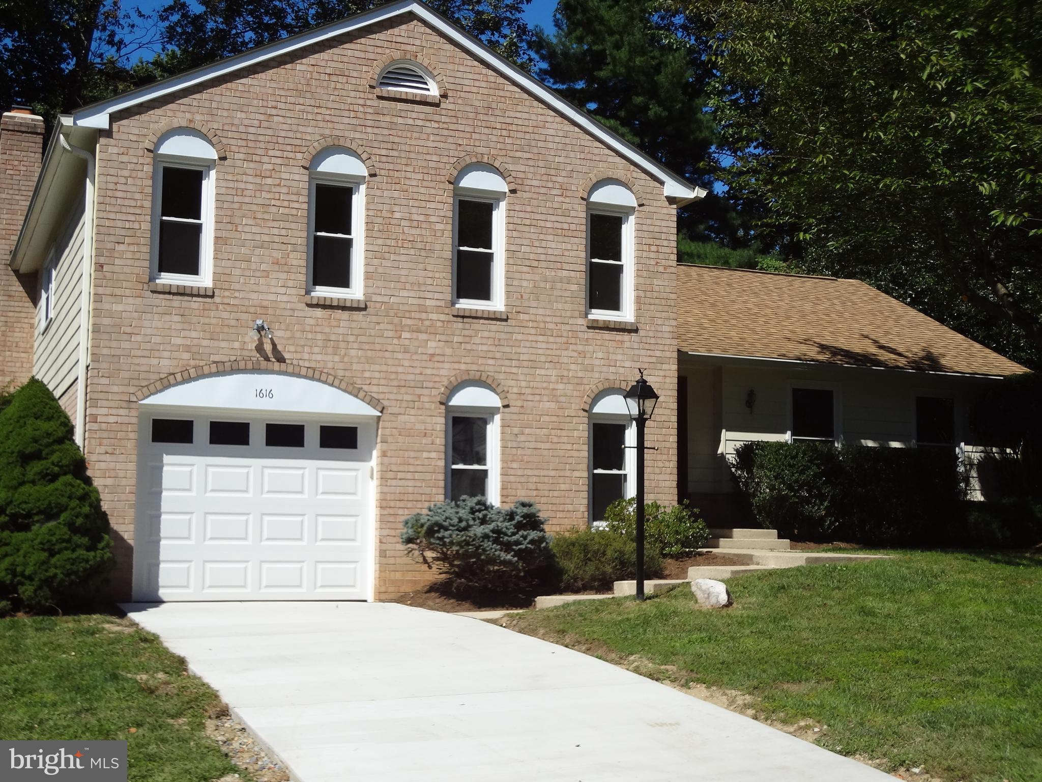 1616 Winding Waye Lane Silver Spring, MD 20902 - Photo 36 of 46 New Driveway and Garage Door