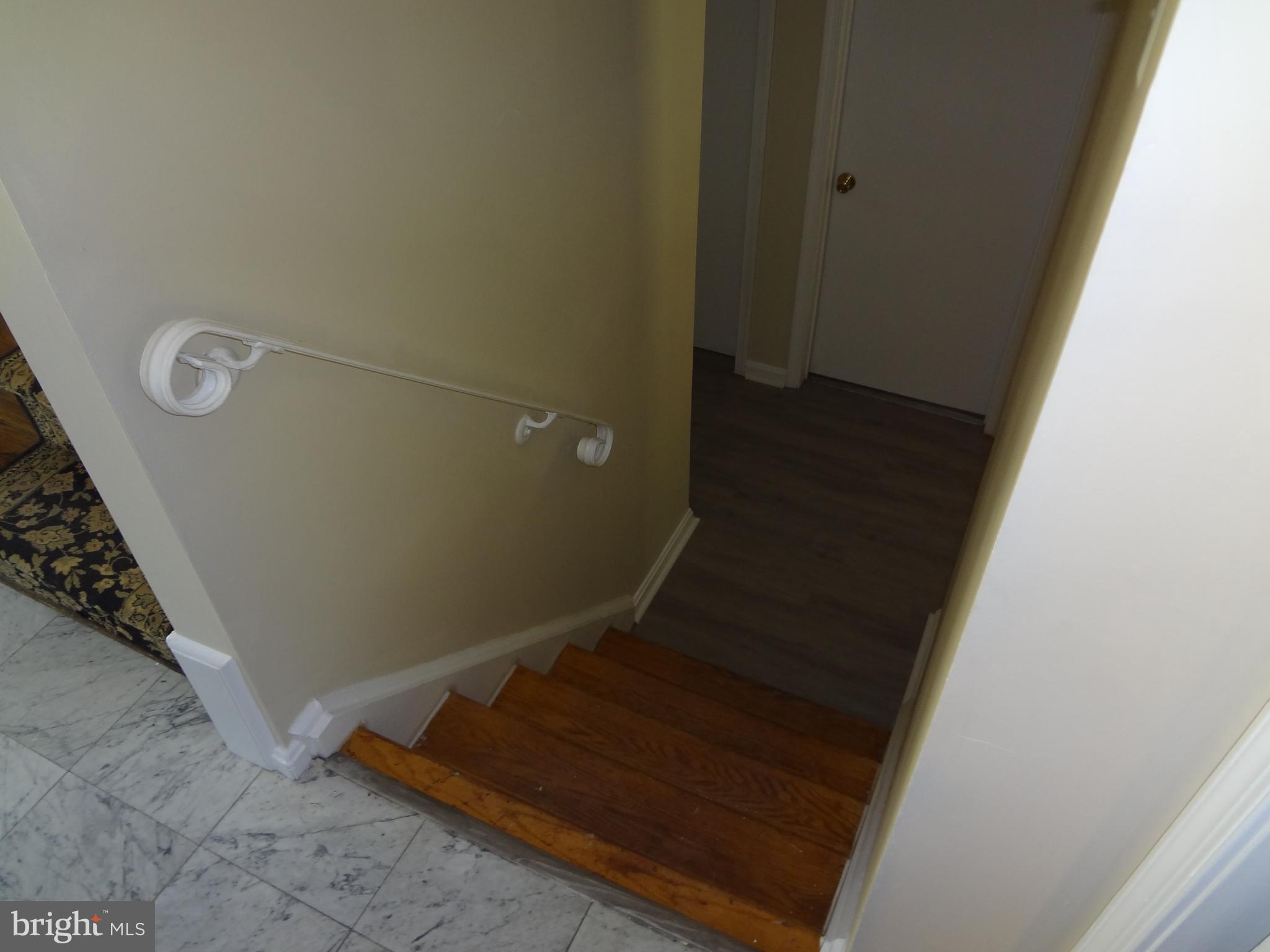 1616 Winding Waye Lane Silver Spring, MD 20902 - Photo 10 of 46 Stairs down the Family Room