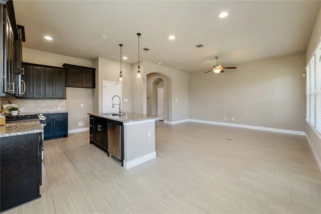 a large kitchen with cabinets