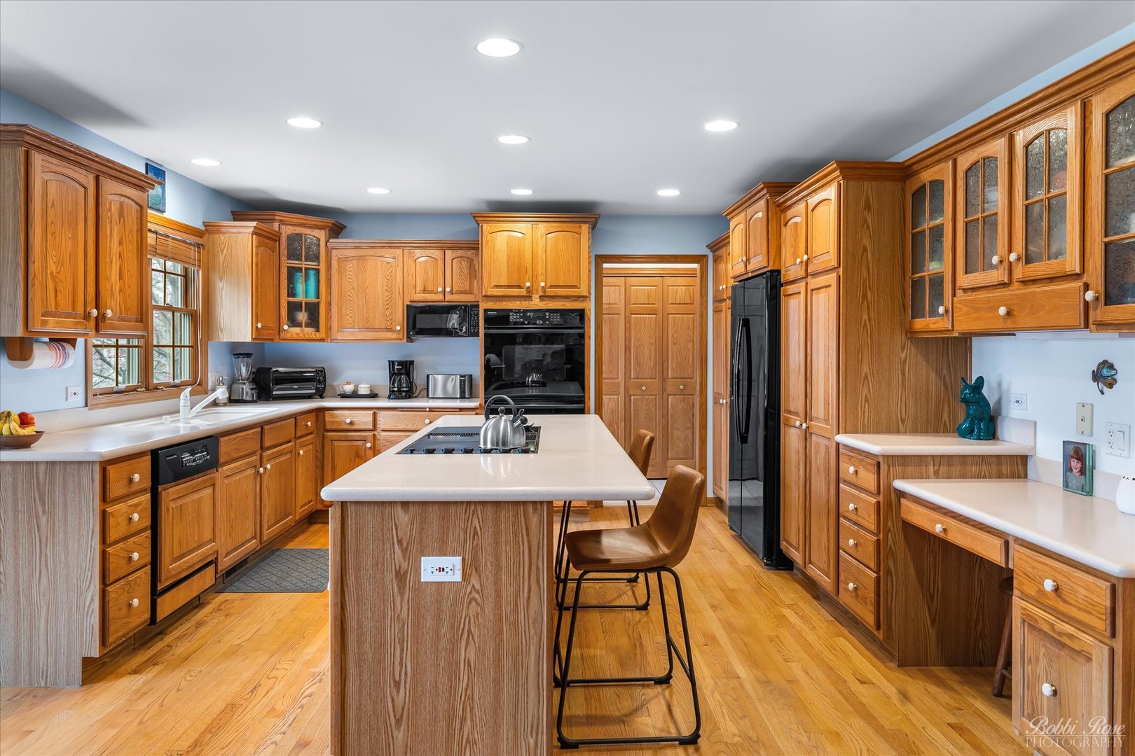 1303 Westley Lane West Dundee, IL 60118 - Photo 13 of 61 a kitchen with stainless steel appliances granite countertop a refrigerator a sink dishwasher a stove with wooden cabinets and floor