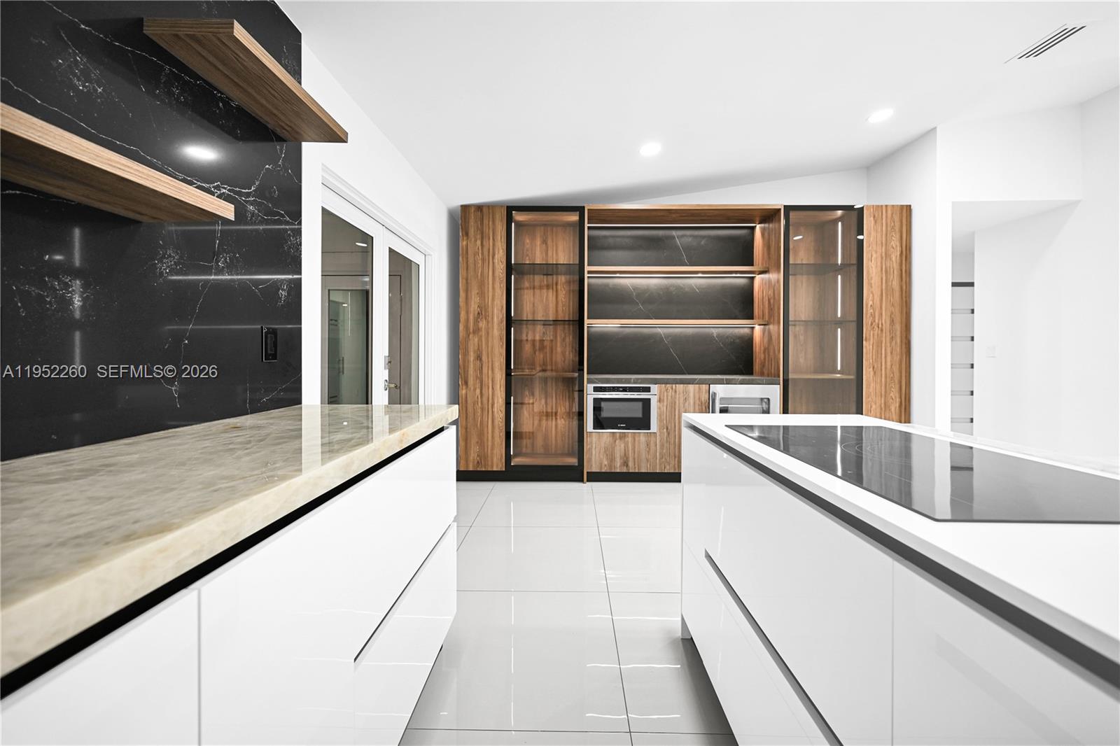 13284 Southwest 39th Street Miami, FL 33175 - Photo 13 of 67 a kitchen with granite countertop a refrigerator and a sink