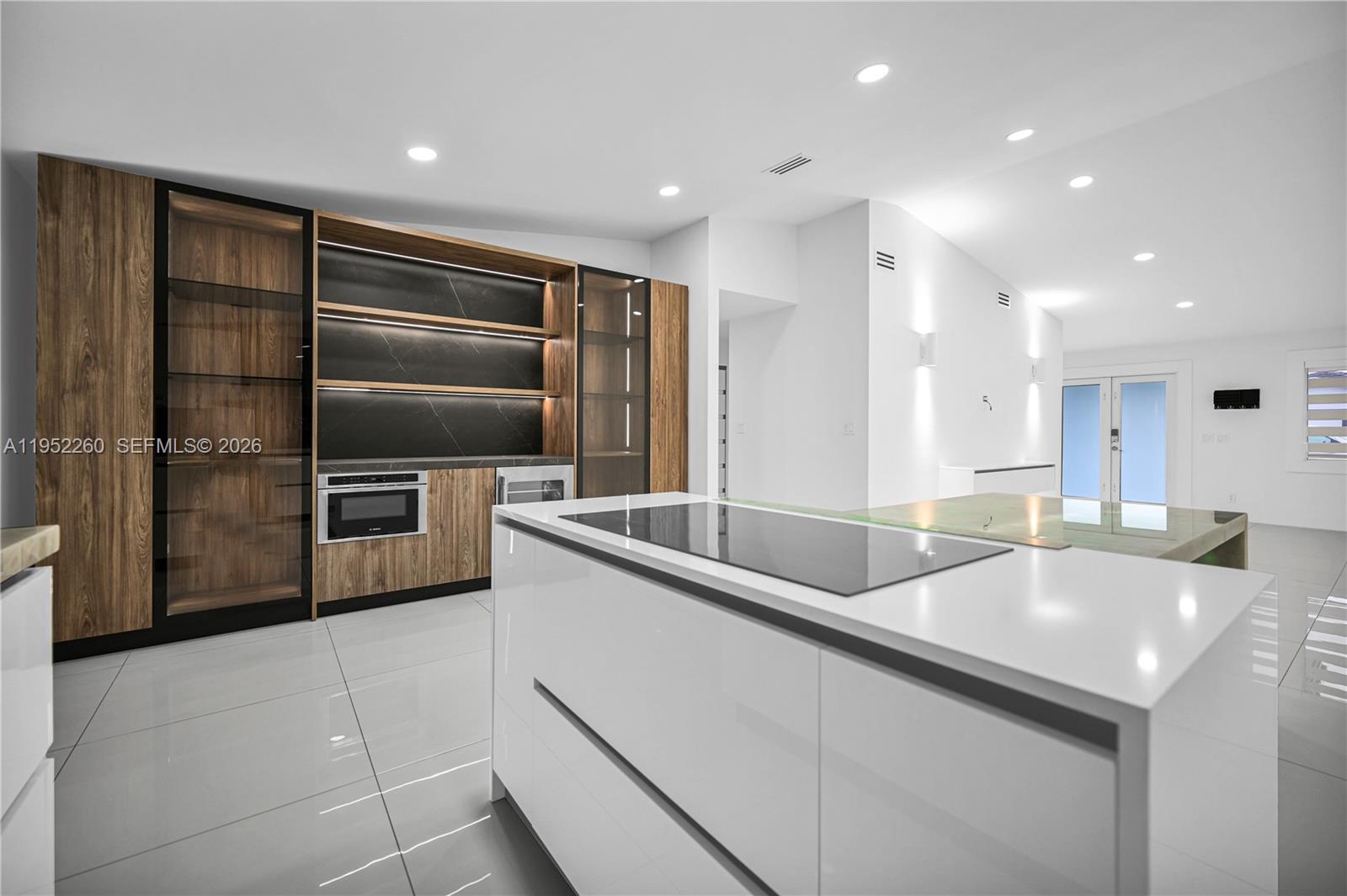 13284 Southwest 39th Street Miami, FL 33175 - Photo 14 of 67 a kitchen with stainless steel appliances granite countertop a sink and a refrigerator