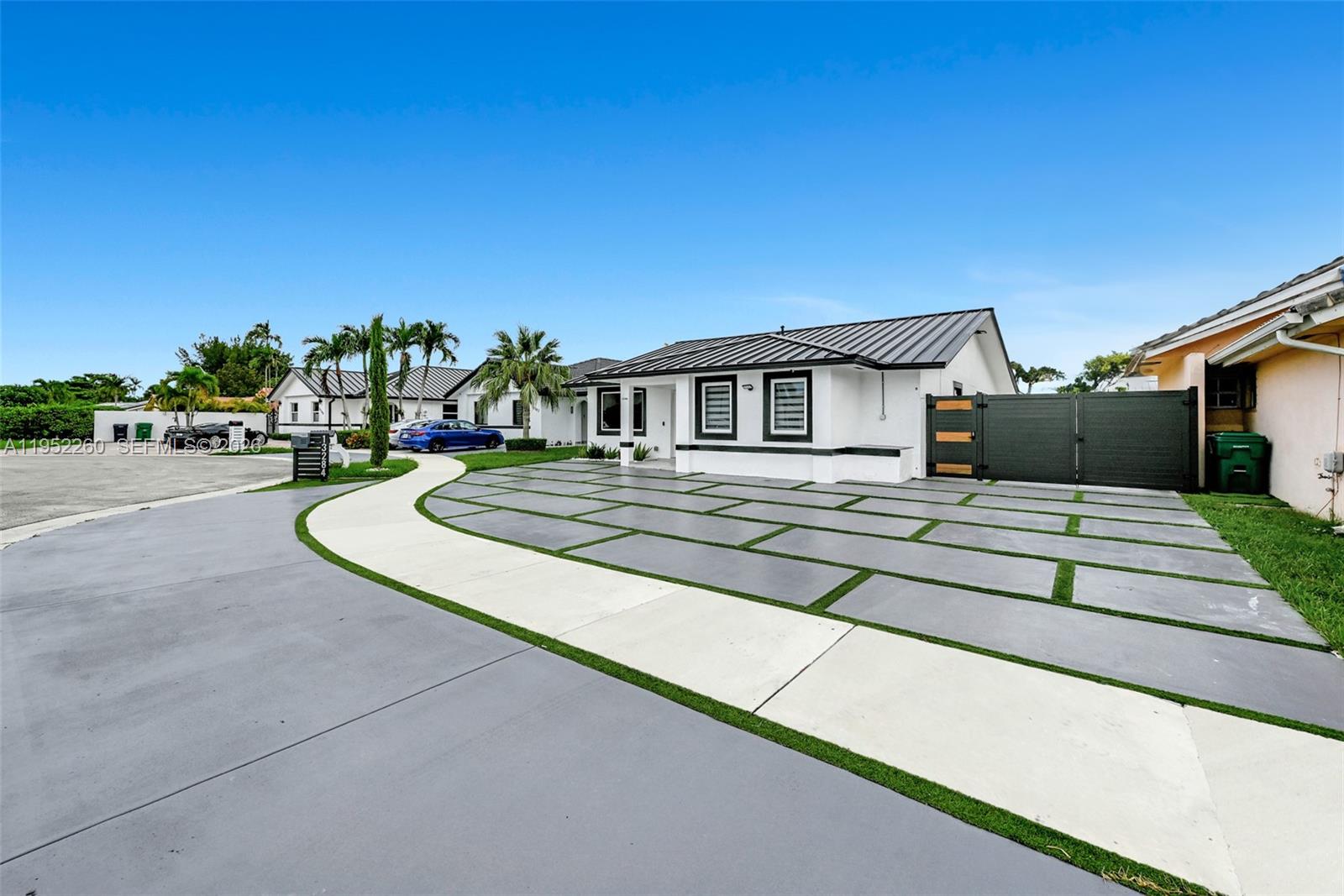 13284 Southwest 39th Street Miami, FL 33175 - Photo 2 of 67 a view of a house with a patio