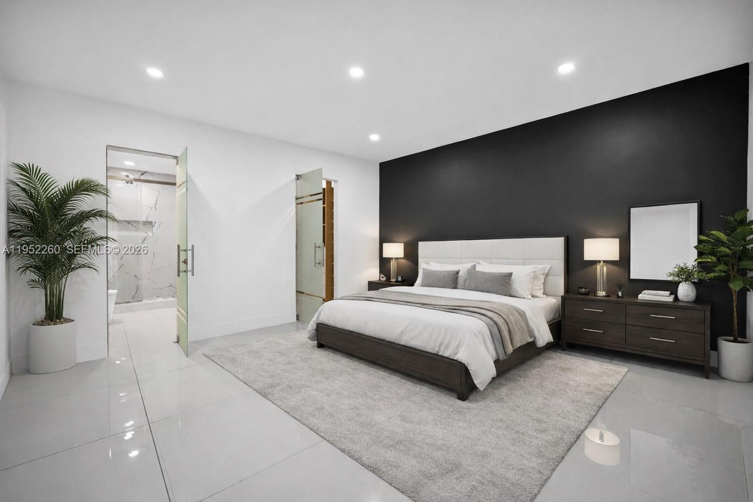 13284 Southwest 39th Street Miami, FL 33175 - Photo 22 of 67 a spacious bedroom with a large bed and a potted plant