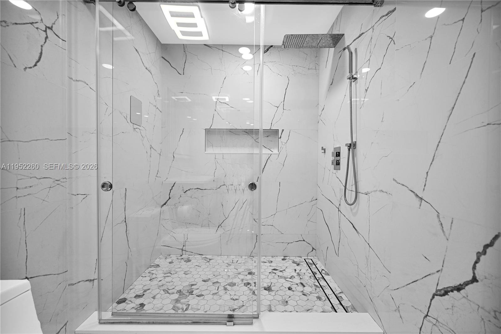13284 Southwest 39th Street Miami, FL 33175 - Photo 28 of 67 a bathroom with a shower