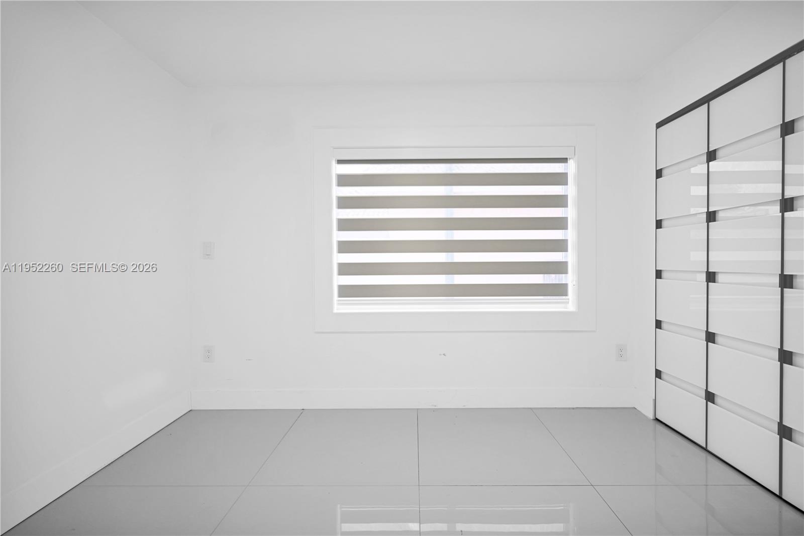 13284 Southwest 39th Street Miami, FL 33175 - Photo 34 of 67 a view of an empty room with window