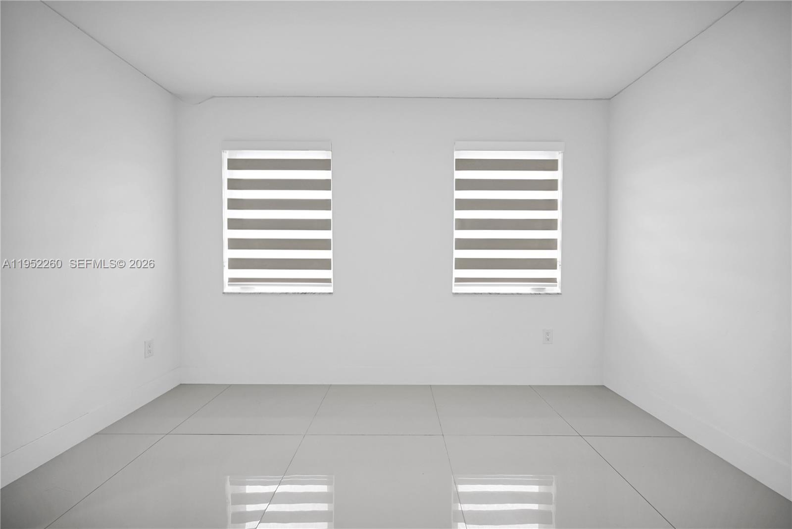13284 Southwest 39th Street Miami, FL 33175 - Photo 45 of 67 a view of empty room with windows