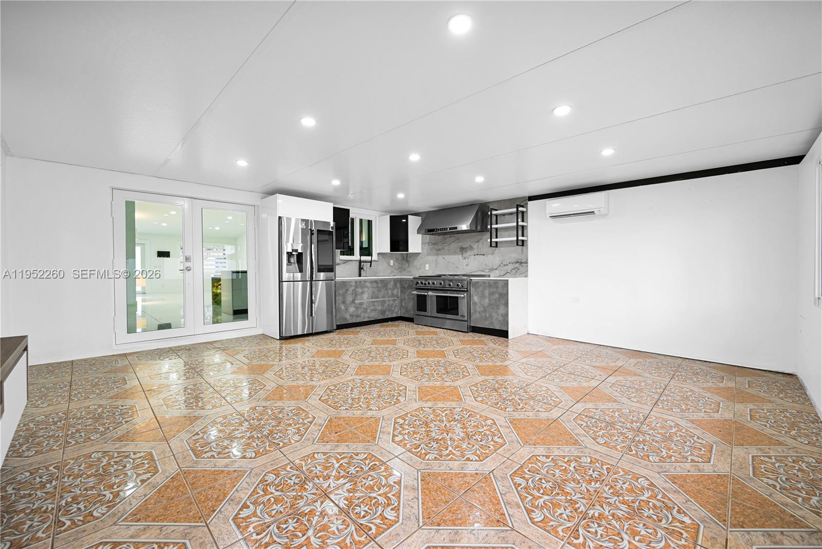 13284 Southwest 39th Street Miami, FL 33175 - Photo 49 of 67 a view of kitchen with stainless steel appliances granite countertop cabinets and a counter top space