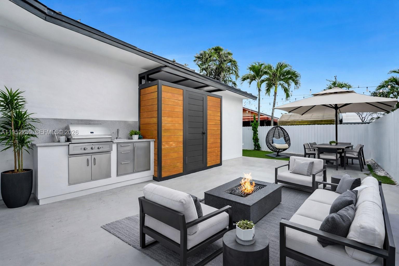 13284 Southwest 39th Street Miami, FL 33175 - Photo 61 of 67 a living room with furniture and a large window