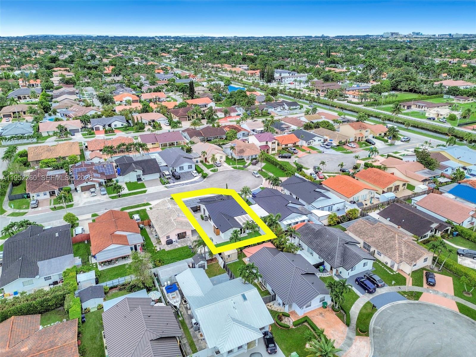 13284 Southwest 39th Street Miami, FL 33175 - Photo 66 of 67 an aerial view of residential houses with outdoor space