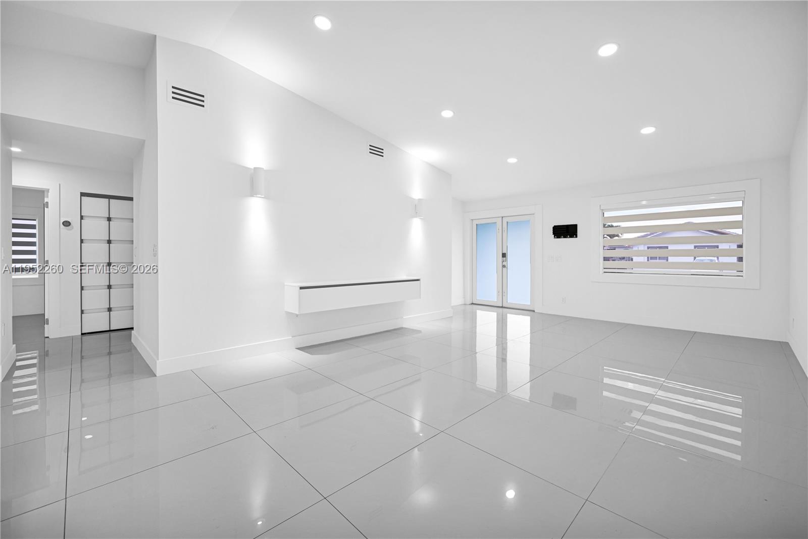 13284 Southwest 39th Street Miami, FL 33175 - Photo 7 of 67 a view of an empty room with a window