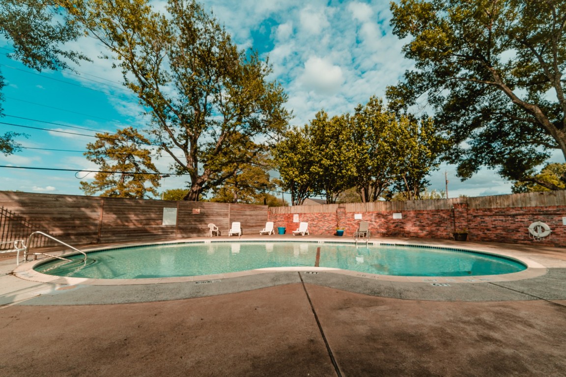 4866 Milwee Street, Unit 22 Houston, TX 77092 - Photo 22 of 23 a view of a house with a yard