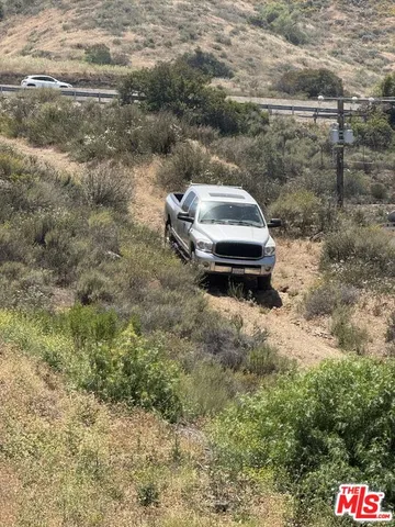 a view of mountain view with mountains in the background