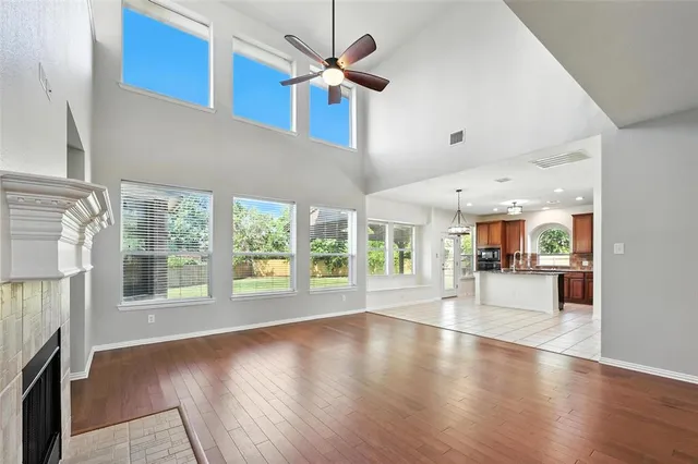 a view of an entryway with wooden floor