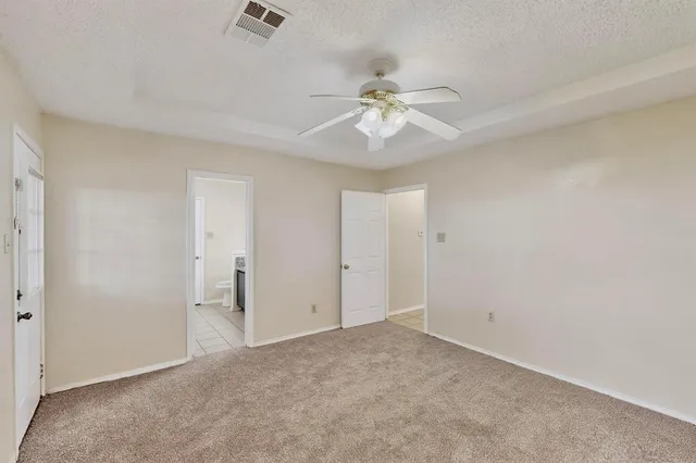 a kitchen with a sink cabinets and stainless steel appliances