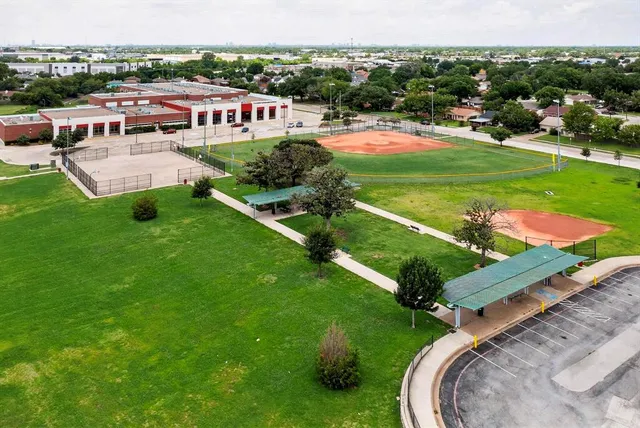 a view of pathway with yard