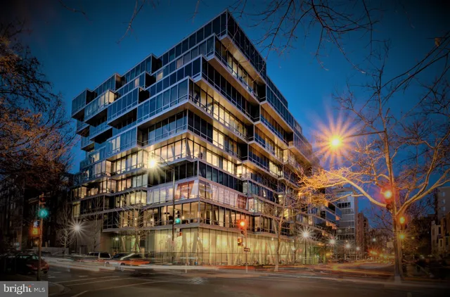 a outdoor living space with furniture a rug and a window