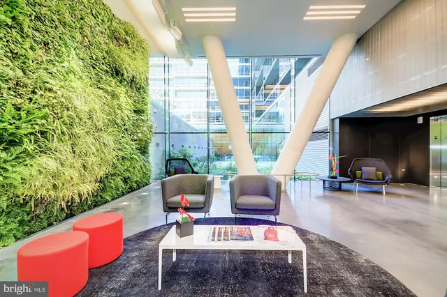 a view of a swimming pool with a lounge chairs
