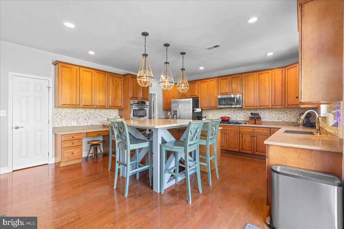2650 Valhalla Road Vineland, NJ 08361 - Photo 11 of 49 a view of a dining room with furniture window and wooden floor