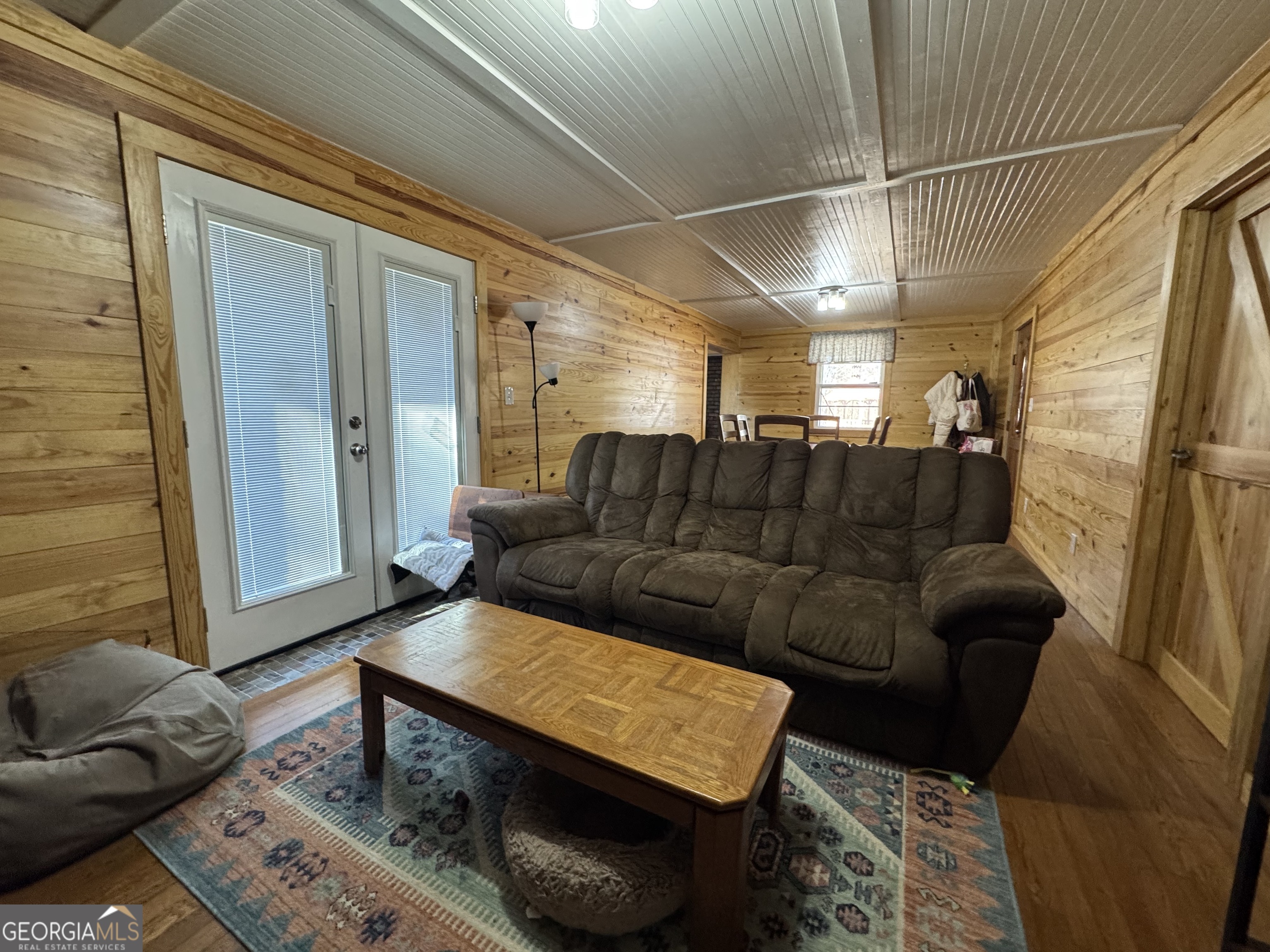 569 Farmers High Road Carrollton, GA 30117 - Photo 5 of 11 a living room with furniture and a couch