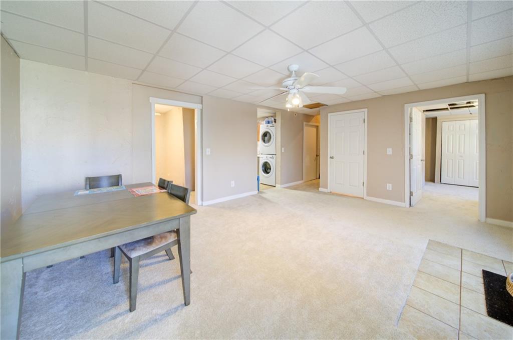 745 Welford Road Northwest Suwanee, GA 30024 - Photo 26 of 32 a view of a room with furniture and windows